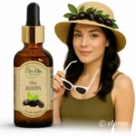 Naturalny olej jojoba Bio Olja – nierafinowany, idealny na lato do skóry i włosów, kobieta w kapeluszu z owocami jojoba