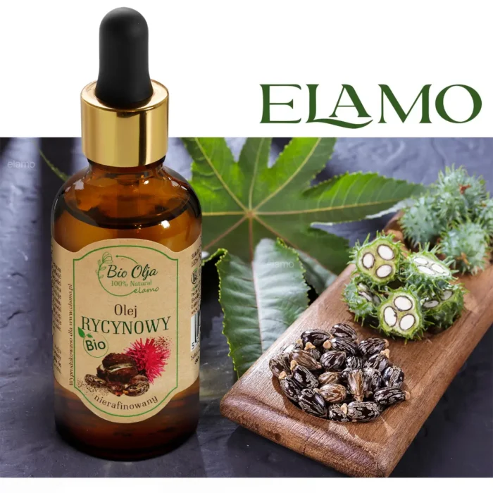 Butelka z naturalnym olejem rycynowym Bio Oilja umieszczona na ciemnym marmurowym blacie obok drewnianej deski z nasionami rącznika i liściami rącznika w tle