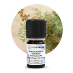 Organiczny olejek z bylicy białej (Artemisia herba-alba) – butelka 5 g Florihana na tle krzewu