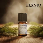 Butelka olejku świerk czarny Florihana na drewnie z gałązkami – aromat żywiczno-balsamiczny.